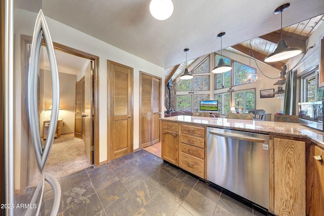 17425 Sequoia Dr, Munds Park, AZ 86017 - kitchen featuring appliances with stainless steel finishes, vaulted ceiling, hanging light fixtures, light stone counters, and dark stone finish floors