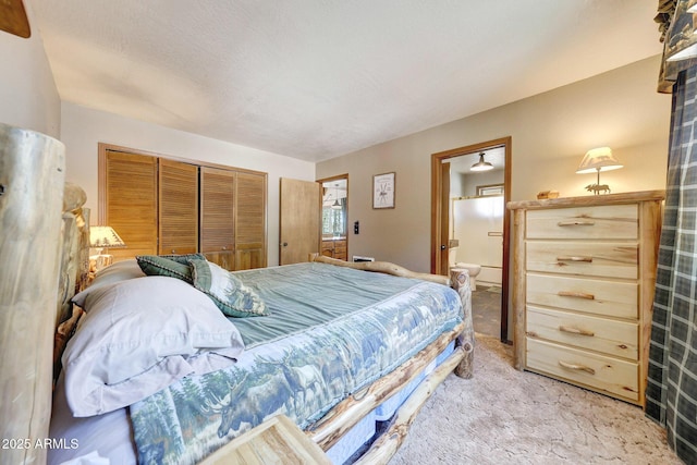 17425 Sequoia Dr, Munds Park, AZ 86017 - bedroom with a closet, light colored carpet, and ensuite bathroom