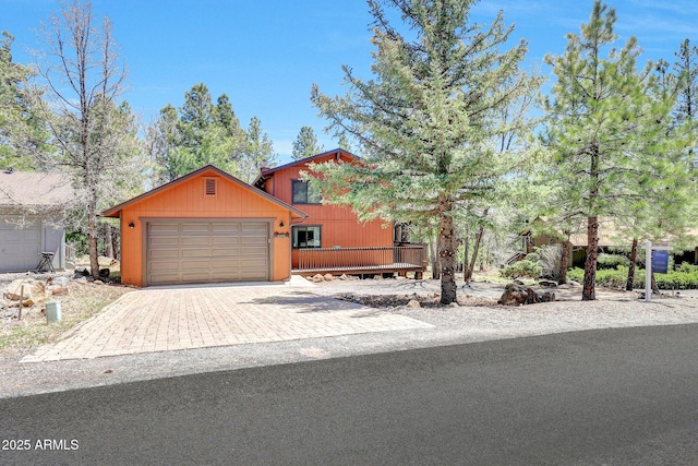 17425 Sequoia Dr, Munds Park, AZ 86017 - chalet / cabin with driveway and an attached garage
