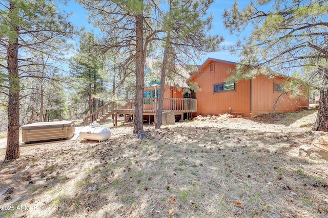 17425 Sequoia Dr, Munds Park, AZ 86017 - rear view of property featuring a hot tub, a deck, and stairs