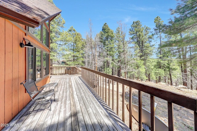 17425 Sequoia Dr, Munds Park, AZ 86017 - wooden deck featuring view of wooded area