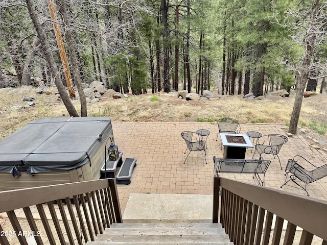 17425 Sequoia Dr, Munds Park, AZ 86017 - view of patio / terrace featuring a hot tub and a fire pit