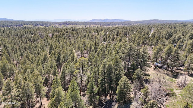 17425 Sequoia Dr, Munds Park, AZ 86017 - aerial view of a forest and a mountainous background