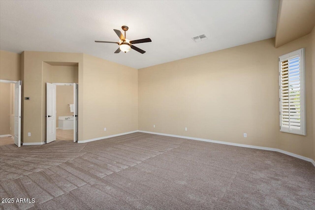 spare room with light carpet and ceiling fan