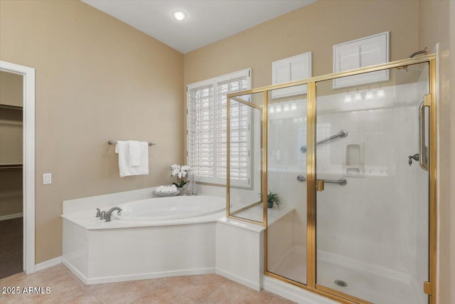 bathroom featuring separate shower and tub and tile patterned floors