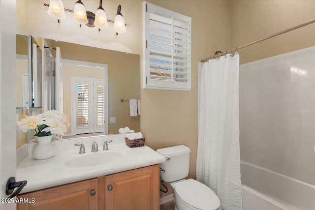 full bathroom featuring vanity, shower / bath combination with curtain, and toilet