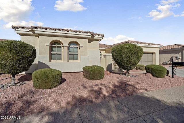 view of front of property with a garage