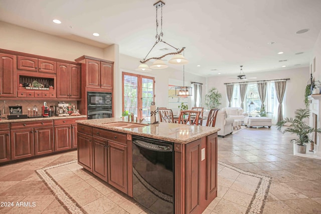 kitchen with a wealth of natural light, black appliances, and recessed lighting