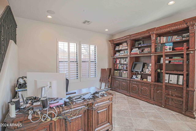 office space with visible vents and recessed lighting