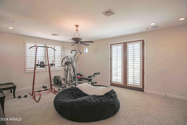 exercise area with carpet flooring, recessed lighting, baseboards, and visible vents