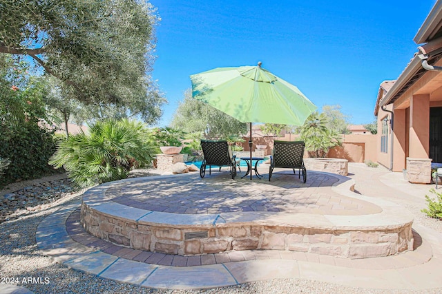 view of patio with fence