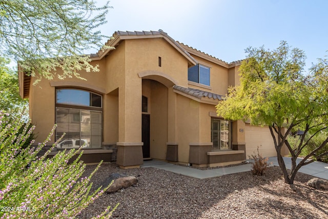 view of front of home with a garage