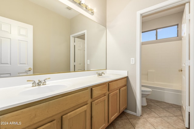 full bathroom with tile patterned floors, vanity, shower / bath combination, and toilet