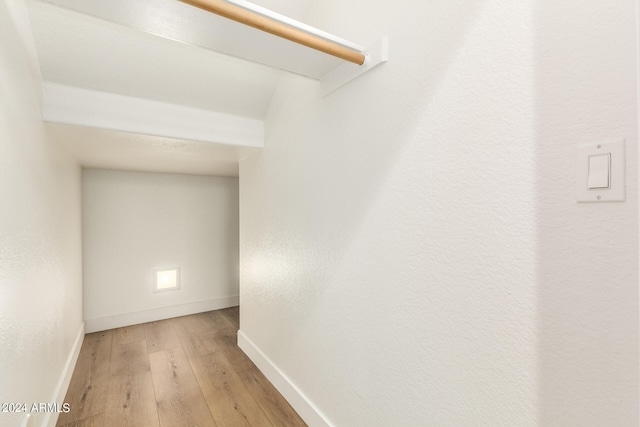 hall featuring wood-type flooring