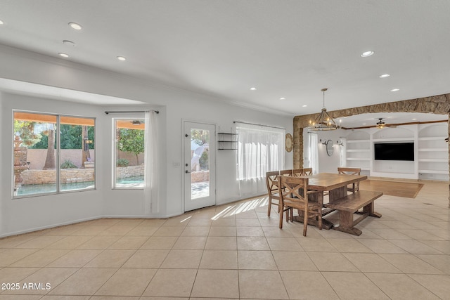 dining room with built in shelves, crown molding, recessed lighting, light tile patterned flooring, and ceiling fan