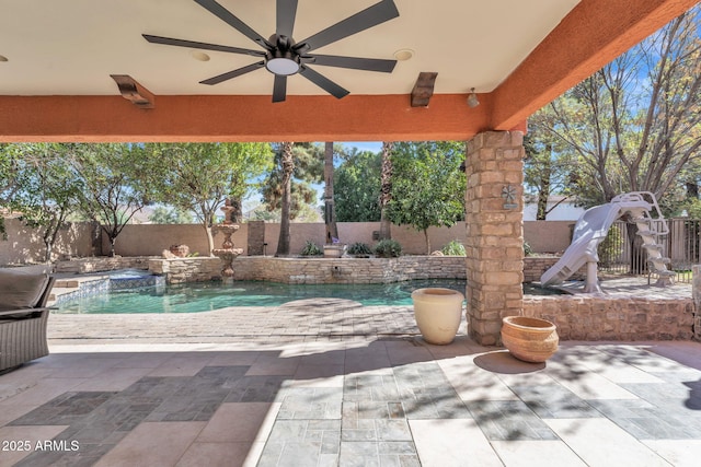 view of patio / terrace with a fenced backyard and a fenced in pool