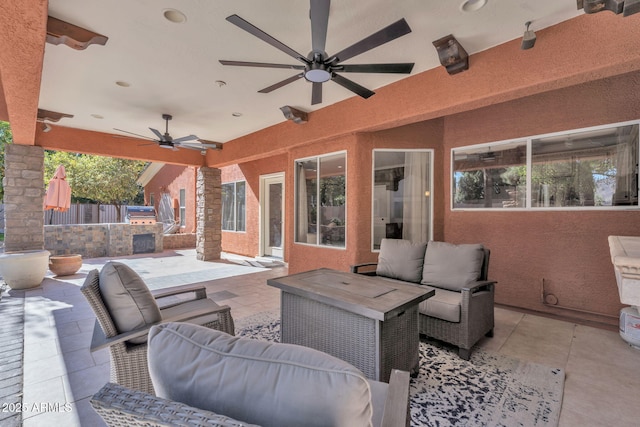 view of patio / terrace featuring an outdoor hangout area and a ceiling fan