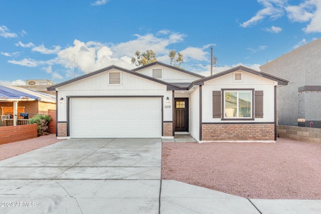 view of front of property featuring a garage