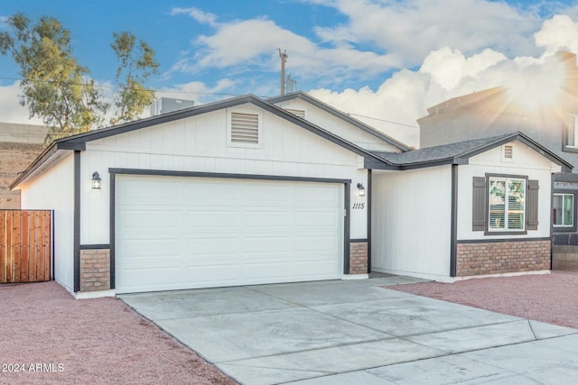 single story home featuring a garage