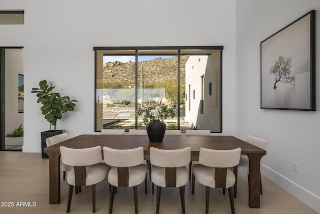 dining room featuring light wood-type flooring