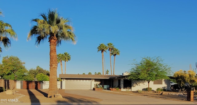 202 N Florence Ave, Litchfield Park, AZ 85340 - view of front of property with a garage, driveway, and fence