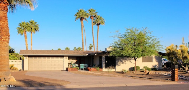 202 N Florence Ave, Litchfield Park, AZ 85340 - ranch-style house featuring concrete driveway and an attached garage