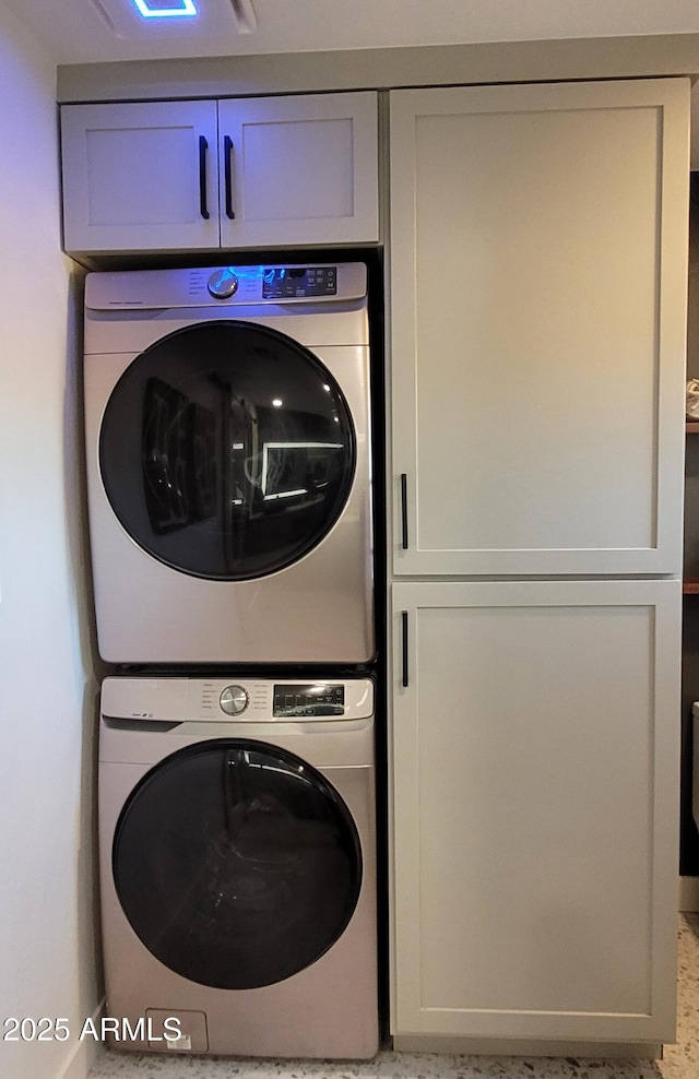 202 N Florence Ave, Litchfield Park, AZ 85340 - washroom featuring estacked washer and dryer and cabinet space