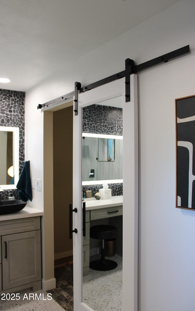 202 N Florence Ave, Litchfield Park, AZ 85340 - bathroom featuring two vanities and decorative backsplash
