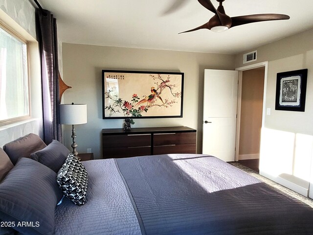 202 N Florence Ave, Litchfield Park, AZ 85340 - bedroom featuring a ceiling fan and baseboards