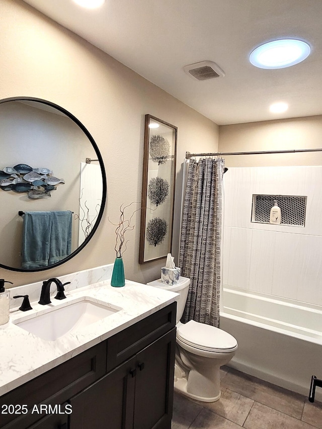 202 N Florence Ave, Litchfield Park, AZ 85340 - bathroom featuring toilet, vanity, and shower / tub combo
