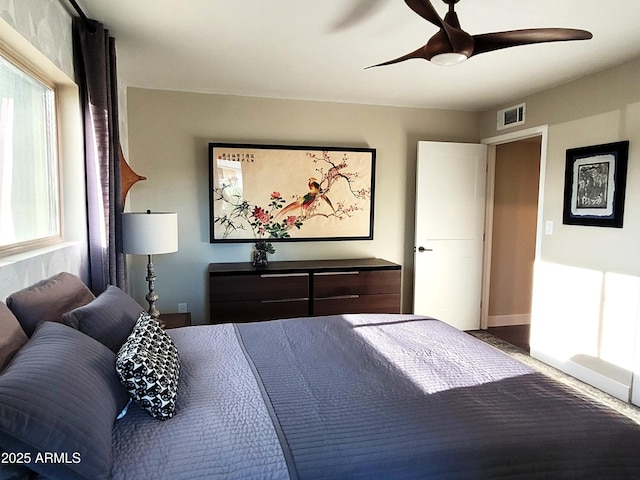 202 N Florence Ave, Litchfield Park, AZ 85340 - bedroom featuring a ceiling fan and baseboards