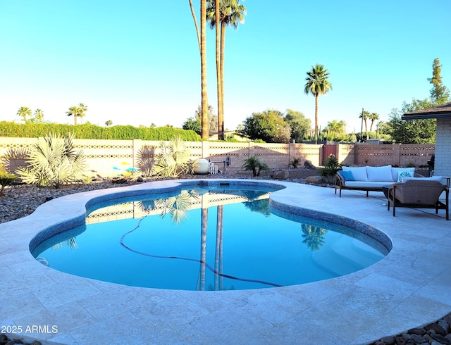 202 N Florence Ave, Litchfield Park, AZ 85340 - view of pool with a patio, an outdoor hangout area, and a fenced backyard