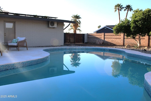 202 N Florence Ave, Litchfield Park, AZ 85340 - view of pool with a fenced backyard and ac unit