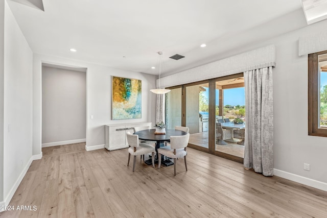 dining room featuring light hardwood / wood-style flooring