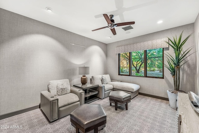 living room featuring ceiling fan