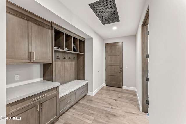 mudroom with light wood-type flooring