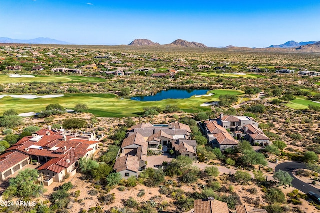 bird's eye view featuring a water and mountain view