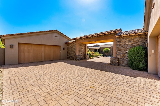 view of front of property with a garage