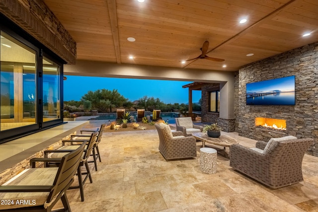 view of patio / terrace with an outdoor hangout area and ceiling fan