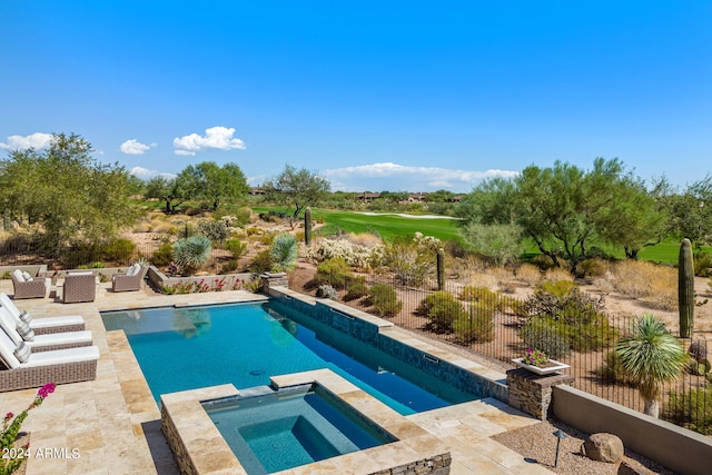 view of pool with an in ground hot tub and a patio area