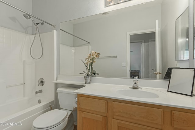 full bath featuring  shower combination, vanity, and toilet