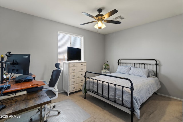 3019 W Trail Dr, Phoenix, AZ 85086 - bedroom with ceiling fan, visible vents, baseboards, and light carpet