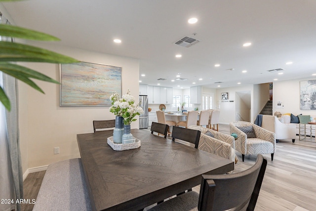 dining room featuring light hardwood / wood-style flooring