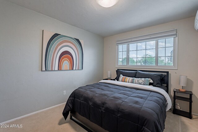 carpeted bedroom with baseboards