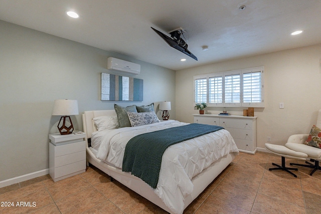bedroom with light tile patterned floors, a wall unit AC, baseboards, and recessed lighting