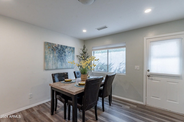 dining room featuring recessed lighting, visible vents, baseboards, and wood finished floors