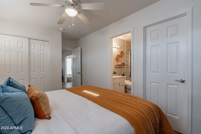 bedroom with ceiling fan, a closet, and ensuite bath