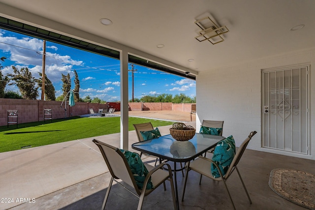 view of patio / terrace featuring outdoor dining area and a fenced backyard