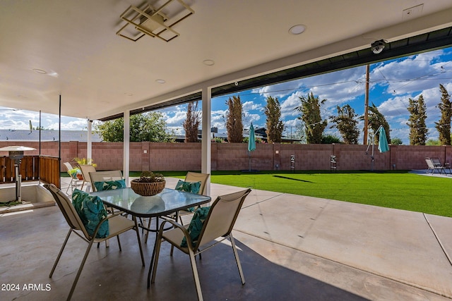 view of patio / terrace with outdoor dining area and a fenced backyard