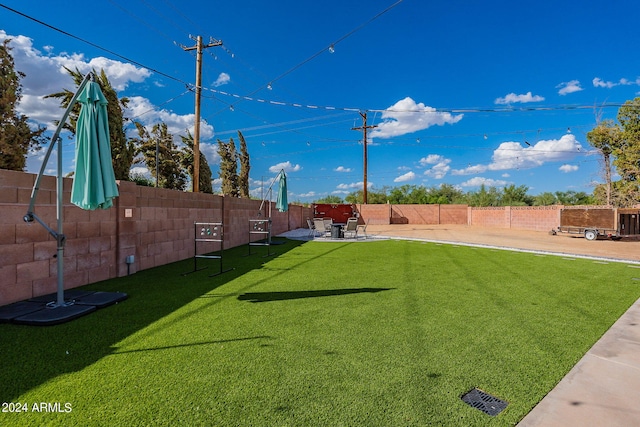 view of yard featuring a fenced backyard